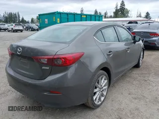 2017 Mazda 3 Touring with VIN 3MZBN1V73HM118104, listed as a IAAI auction lot 42139361 with 71,615 mi miles and . Bid and sale history available at DreamBid. Image 4.
