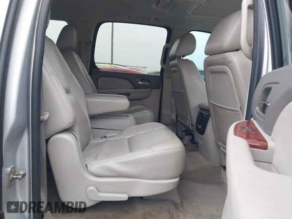 2013 Chevrolet Suburban LTZ with VIN 1GNSCKE02DR369777, listed as a IAAI auction lot 41565371 with 205,768 mi miles and . Bid and sale history available at DreamBid. Image 8.