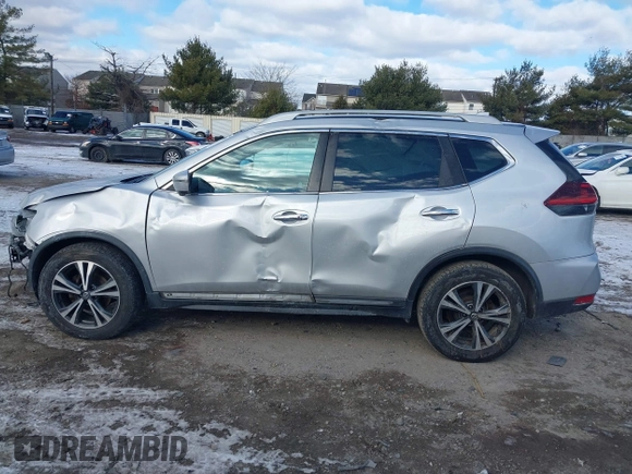 2018 Nissan Rogue S with VIN 5N1AT2MT2JC738034, listed as a IAAI auction lot 41286839 with 125,037 mi miles and . Bid and sale history available at DreamBid. Image 14.