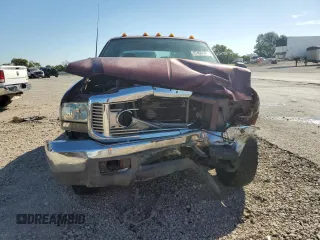2000 Ford F-350 XL with VIN 1FTSW30F6YEB89796, listed as a Copart auction lot 67490144 with 517,242 mi miles and Salvage Title. Bid and sale history available at DreamBid. Image 5.