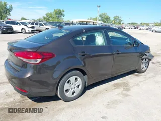 2018 Kia Forte LX with VIN 3KPFK4A70JE217385, listed as a IAAI auction lot 39955381 with 99,060 mi miles. Bid and sale history available at carsss.com. Image 4.
