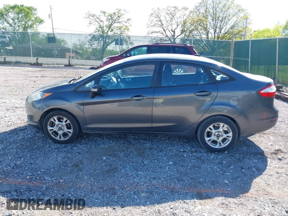 2015 Ford Fiesta SE z VIN 3FADP4BJ7FM158471, wystawiony jako IAAI lot #42090819 z przebiegiem 139 779 mil mil oraz . Historia ofert i sprzedaży dostępna na DreamBid. Obrazek 14.