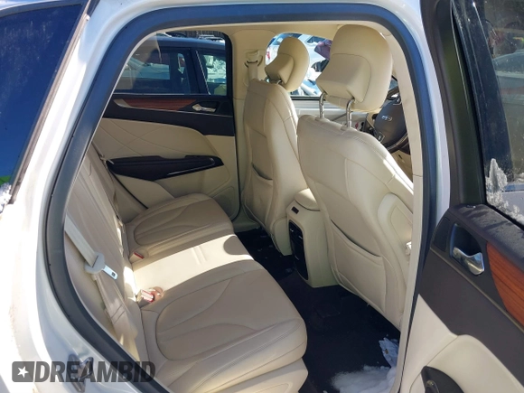 2016 Lincoln MKC Reserve with VIN 5LMTJ3DH9GUJ21388, listed as a IAAI auction lot 41248130 with 106,258 mi miles and . Bid and sale history available at DreamBid. Image 8.