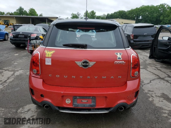 2015 MINI Countryman S with VIN WMWZC5C54FWP42858, listed as a Copart auction lot 60684185 with 83,163 mi miles and Salvage title. Bid and sale history available at DreamBid. Image 6.