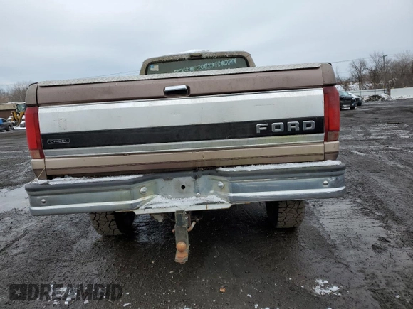 1993 Ford F-250 с VIN 1FTHX26M7PKA39302, выставлен на аукционе Copart как лот 43181105 с пробегом 274 377 миль миль и Списание • Salvage title. История ставок и продаж доступна на DreamBid. Изображение 6.