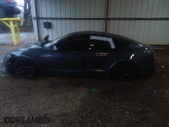 2022 Tesla Model S with VIN 5YJSA1E57NF484158, listed as a IAAI auction lot 41531574 with 16,079 mi miles and . Bid and sale history available at DreamBid. Image 14.