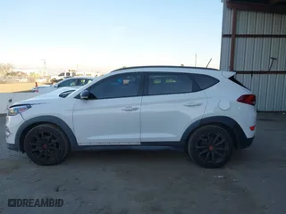 2017 Hyundai Tucson Value with VIN KM8J33A27HU541527, listed as a IAAI auction lot 41382244 with 65,848 mi miles. Bid and sale history available at carsss.com. Image 14.
