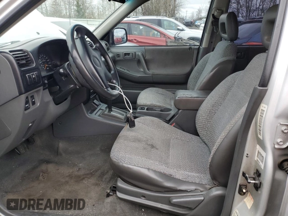 1998 Isuzu Rodeo S z VIN 4S2CK58W1W4327395, wystawiony jako Copart lot #44400715 z przebiegiem 193 659 mil mil oraz Szkoda całkowita • Salvage title. Historia ofert i sprzedaży dostępna na DreamBid. Obrazek 7.