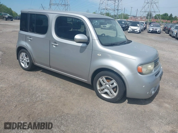 2010 Nissan Cube S z VIN JN8AZ2KR9AT166376, wystawiony jako IAAI lot #42252505 z przebiegiem 147 169 mil mil oraz . Historia ofert i sprzedaży dostępna na DreamBid. Obrazek 1.
