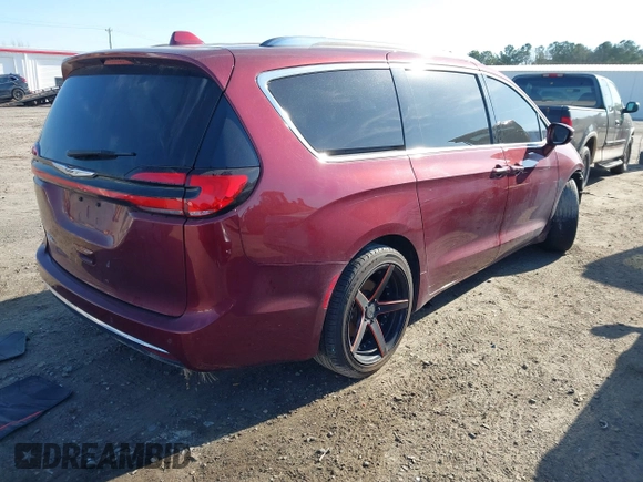 2021 Chrysler Pacifica Touring L z VIN 2C4RC1BG9MR588605, wystawiony jako IAAI lot #41830744 z przebiegiem 106 937 mil mil oraz . Historia ofert i sprzedaży dostępna na DreamBid. Obrazek 4.