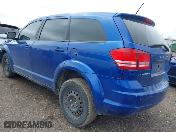 2015 Dodge Journey SE z VIN 3C4PDCAB8FT552555, wystawiony jako IAAI lot #42195398 z przebiegiem 149 503 mil mil oraz . Historia ofert i sprzedaży dostępna na DreamBid. Obrazek 3.