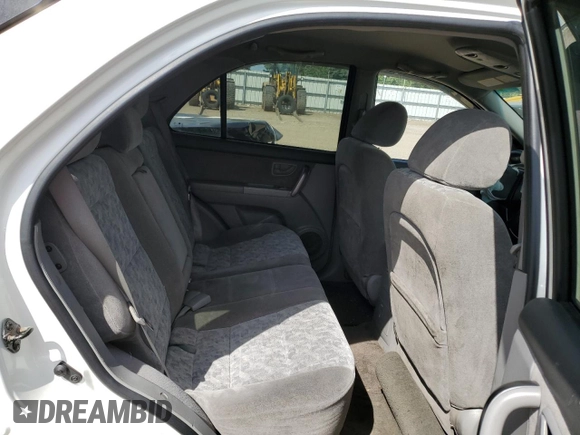 2007 Kia Sorento LX z VIN KNDJD736X75729895, wystawiony jako Copart lot #68039404 z przebiegiem 201 067 mil mil oraz Szkoda całkowita • Salvage title. Historia ofert i sprzedaży dostępna na DreamBid. Obrazek 10.