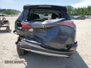 2016 Toyota RAV4 Limited z VIN JTMDFREVXGJ076533, wystawiony jako Copart lot #57480995 z przebiegiem 124 626 mil mil oraz Szkoda całkowita • Salvage title. Historia ofert i sprzedaży dostępna na DreamBid. Obrazek 7.