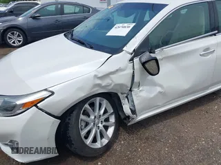 2013 Toyota Avalon XLE z VIN 4T1BK1EB2DU041971, wystawiony jako IAAI lot #42070838 z przebiegiem 89 299 mil mil oraz . Historia ofert i sprzedaży dostępna na DreamBid. Obrazek 6.