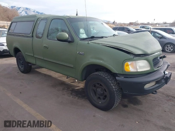 1997 Ford F-150 XL with VIN 1FTDX1861VKA60604, listed as a IAAI auction lot 41060909 with 269,715 mi miles. Bid and sale history available at carsss.com. Image 1.