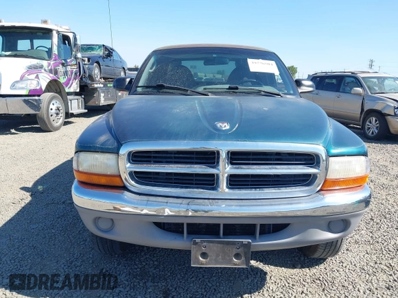 1999 Dodge Dakota SLT with VIN 1B7GG22Y2XS157214, listed as a IAAI auction lot 39776504 with 144,928 mi miles and . Bid and sale history available at carsss.com. Image 12.