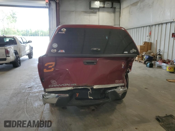 2004 GMC Canyon SLE Z71 with VIN 1GTDT196748204405, listed as a Copart auction lot 70221384 with 207,718 mi miles and Non Repairable. Bid and sale history available at carsss.com. Image 6.