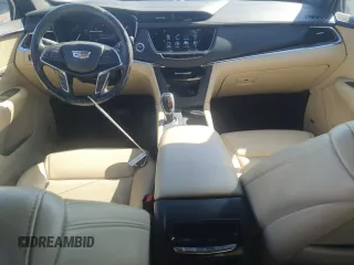 2019 Cadillac XT5 Premium Luxury AWD z VIN 1GYKNFRS5KZ252885, wystawiony jako Copart lot #49729865 z przebiegiem 54 593 mil mil oraz Szkoda całkowita • Salvage title. Historia ofert i sprzedaży dostępna na DreamBid. Obrazek 8.
