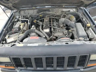 1998 Jeep Cherokee Sport with VIN 1J4FJ68S6WL188802, listed as a Copart auction lot 52094005 with 199,586 mi miles and Salvage Title. Bid and sale history available at carsss.com. Image 12.