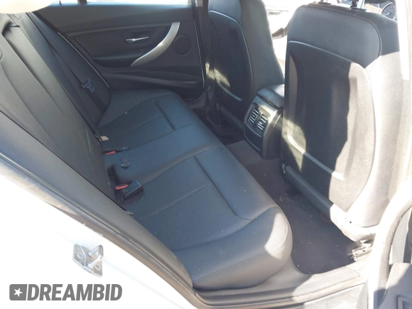 2013 BMW 3 Series 320i with VIN WBA3B1C56DF462549, listed as a IAAI auction lot 41411287 with 119,146 mi miles. Bid and sale history available at carsss.com. Image 8.