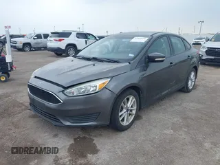 2017 Ford Focus SE z VIN 1FADP3F21HL205009, wystawiony jako IAAI lot #42305641 z przebiegiem 75 160 mil mil oraz . Historia ofert i sprzedaży dostępna na DreamBid. Obrazek 2.