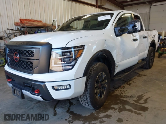 2024 Nissan Titan Pro-4X with VIN 1N6AA1ED0RN112314, listed as a IAAI auction lot 42465520 with 8,711 mi miles and . Bid and sale history available at DreamBid. Image 2.
