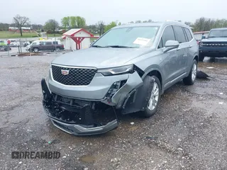 2023 Cadillac XT6 FWD Luxury with VIN 1GYKPAR42PZ231126, listed as a IAAI auction lot 41959366 with 16,156 mi miles and . Bid and sale history available at DreamBid. Image 18.
