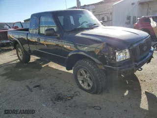 2005 Ford Ranger XLT with VIN 1FTZR45E05PA55216, listed as a Copart auction lot 41734955 with 235,206 mi miles and Salvage Title. Bid and sale history available at carsss.com. Image 4.