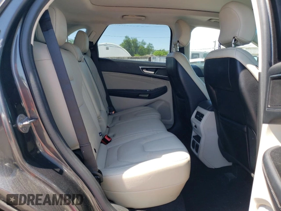 2015 Ford Edge Titanium z VIN 2FMPK4K8XFBB98334, wystawiony jako Copart lot #56953495 z przebiegiem 110 129 mil mil oraz Szkody całkowita. Historia ofert i sprzedaży dostępna na DreamBid. Obrazek 11.