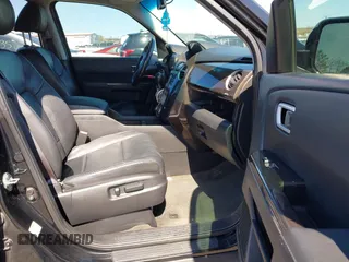 2014 Honda Pilot Touring with VIN 5FNYF4H94EB049495, listed as a IAAI auction lot 41937134 with 149,445 mi miles and . Bid and sale history available at carsss.com. Image 5.