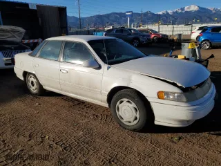 1995 Mercury Sable GS with VIN 1MELM50UXSG617772, listed as a Copart auction lot 86834064 with 120,994 mi miles and Salvage Title. Bid and sale history available at carsss.com. Image 4.