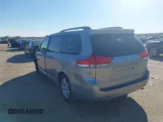 2011 Toyota Sienna LE AAS with VIN 5TDKK3DCXBS143921, listed as a IAAI auction lot 41689053 with 199,854 mi miles. Bid and sale history available at carsss.com. Image 3.