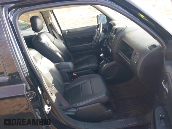 2014 Jeep Patriot High Altitude with VIN 1C4NJPFAXED888929, listed as a IAAI auction lot 41474736 with 117,697 mi miles and . Bid and sale history available at carsss.com. Image 5.