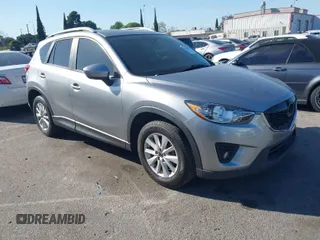 2013 Mazda CX-5 Touring with VIN JM3KE2CE3D0123138, listed as a IAAI auction lot 41818678 with 173,909 mi miles. Bid and sale history available at carsss.com. Image 1.