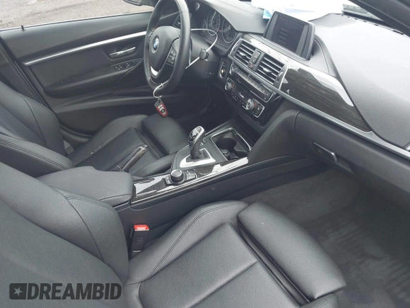 2018 BMW 3 Series 330i xDrive with VIN WBA8D9C52JEM32318, listed as a IAAI auction lot 42309352 with 61,828 mi miles and . Bid and sale history available at DreamBid. Image 5.