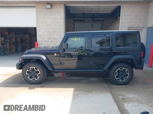 2015 Jeep Wrangler Unlimited Rubicon Hard Rock с VIN 1C4HJWFG0FL550247, выставлен на аукционе IAAI как лот 42474614 с пробегом 93 084 миль миль и . История ставок и продаж доступна на DreamBid. Изображение 14.