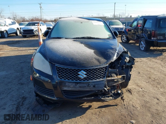 2010 Suzuki Kizashi SE with VIN JS2RE9A34A6100807, listed as a IAAI auction lot 41690974 with 122,419 mi miles and . Bid and sale history available at DreamBid. Image 12.