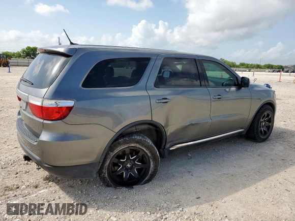2013 Dodge Durango SXT with VIN 1C4RDHAGXDC592730, listed as a Copart auction lot 60841945 with 130,239 mi miles and Salvage title. Bid and sale history available at DreamBid. Image 3.