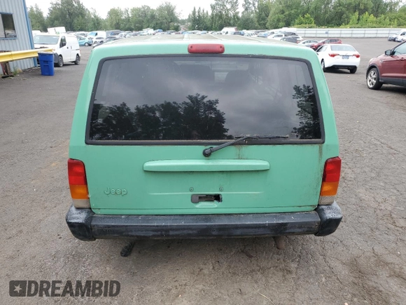 1999 Jeep Cherokee SE with VIN 1J4FF28SXXL641556, listed as a Copart auction lot 62605065 with Not provided miles and Salvage title. Bid and sale history available at DreamBid. Image 6.
