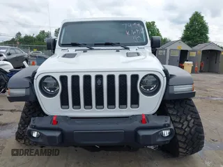 2021 Jeep Wrangler Unlimited Rubicon with VIN 1C4HJXFG7MW527498, listed as a IAAI auction lot 42393520 with 18,085 mi miles and . Bid and sale history available at DreamBid. Image 12.