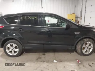2015 Ford Escape SE with VIN 1FMCU9GX8FUB42666, listed as a IAAI auction lot 41936045 with 178,194 mi miles and . Bid and sale history available at DreamBid. Image 13.