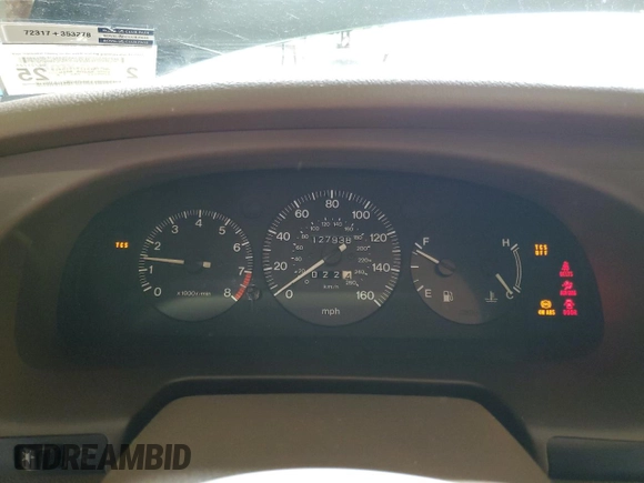 2000 Mazda Millenia z VIN JM1TA2212Y1610919, wystawiony jako Copart lot #80375014 z przebiegiem 127 938 mil mil oraz Szkoda całkowita • Salvage title. Historia ofert i sprzedaży dostępna na DreamBid. Obrazek 9.