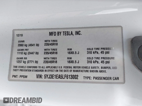 2020 Tesla Model 3 Standard Range Plus with VIN 5YJ3E1EA5LF613002, listed as a IAAI auction lot 42129085 with 55,672 mi miles. Bid and sale history available at carsss.com. Image 9.