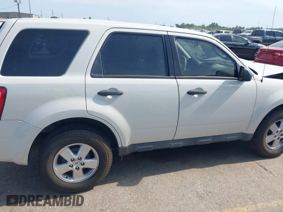 2012 Ford Escape XLS with VIN 1FMCU0C73CKA96298, listed as a IAAI auction lot 42280695 with 106,454 mi miles and . Bid and sale history available at DreamBid. Image 13.