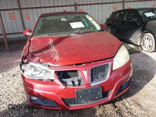 2009 Pontiac G6 1SB with VIN 1G2ZJ57KX94259078, listed as a IAAI auction lot 41223904 with 129,681 mi miles and . Bid and sale history available at DreamBid. Image 13.