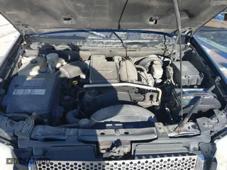2005 GMC Envoy SLE with VIN 1GKDT13S952288760, listed as a IAAI auction lot 41671656 with 1 mi miles. Bid and sale history available at carsss.com. Image 10.