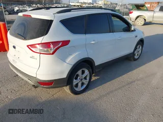 2016 Ford Escape SE with VIN 1FMCU9GX0GUC03719, listed as a IAAI auction lot 41781963 with 85,382 mi miles. Bid and sale history available at carsss.com. Image 4.