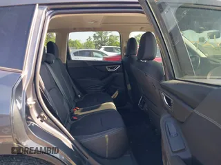 2021 Subaru Forester Premium z VIN JF2SKAJC9MH562537, wystawiony jako IAAI lot #42673896 z przebiegiem 66 819 mil mil oraz . Historia ofert i sprzedaży dostępna na DreamBid. Obrazek 8.