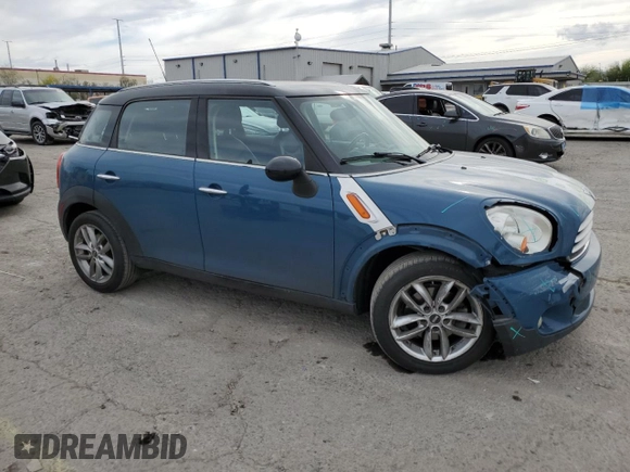 2012 MINI Countryman with VIN WMWZB3C51CWM02831, listed as a Copart auction lot 53821445 with 149,654 mi miles and Salvage Title. Bid and sale history available at DreamBid. Image 4.