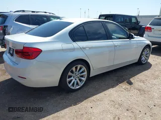 2018 BMW 3 Series 320i xDrive with VIN WBA8A3C59JA492173, listed as a IAAI auction lot 41850946 with 76,196 mi miles and . Bid and sale history available at DreamBid. Image 4.